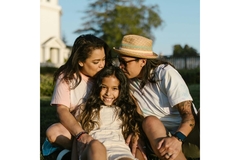 Image A cute Native American family.