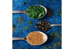 Image Spices on spoons.