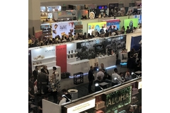 Image Natural Product Expo West 2024 trade hall with visitors