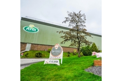 Image A Taw Valley sign is standing in front of a Arla Foods building.