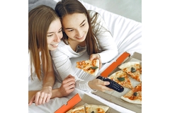 Image Two women eating pizza
