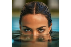 Image half submerged head in water
