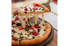 Vegetable pizza with plant-based cheese.