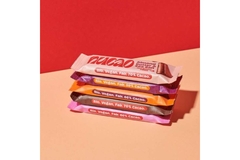 Chocolate bars in paper-based packaging.