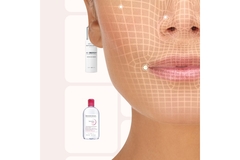 Image Half of a woman face covered with dots on it.