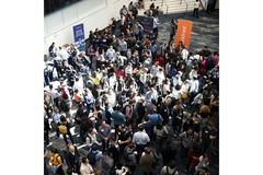 Image Aerial shot of people at an event.
