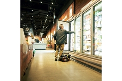Man shopping in supermarket.