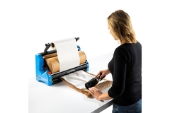 Image Woman and wrapping machine.