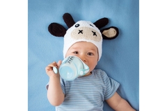 Image Infant drinking formula.