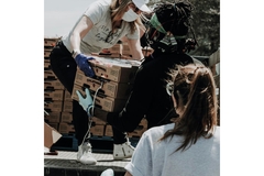 Image People distributing food at a food bank.
