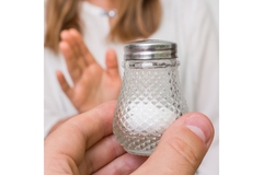 Woman refusing salt.