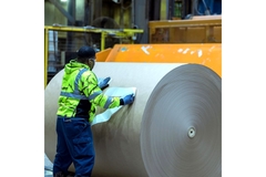 Image Man in paper mill.