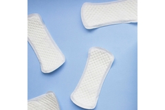 Panty liners on a blue background.