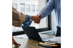 Shaking hands upon acquisition.