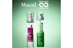 Murad serums in pink and green refillable bottles.