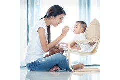 Image Mother feeding baby.
