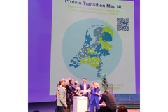 Image Launch of the Protein Transition Map of Foodvalley, people pushing a button together on stage.