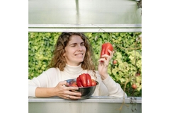 Image Woman hold organic vegetables papers