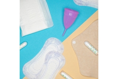 Image An assortment period products on a blue and yellow background.