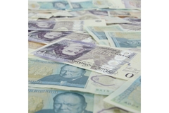 Image close up of money in pounds bank notes