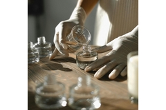 Image Perfumer mixing fragrances