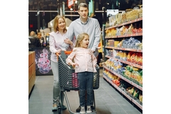 Image parents and girls child in a supermarket