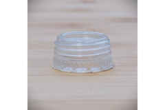 Image Bottle closure on table.