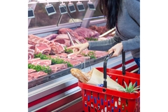 Image Woman shopping for red meat.