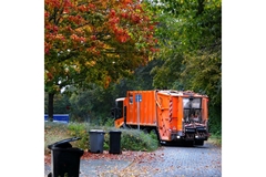 Image waste lorry collecting household bin residue