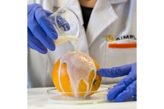 Image Edible coating on orange.