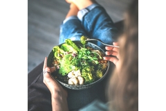 Image Woman sits down to a portion controlled meal