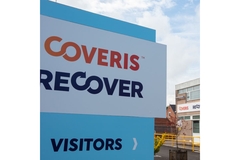 Image Coveris sign in front of recycling facility.