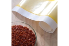 Coated paper and resins on the side.
