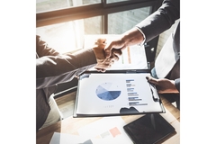 Businessmen shake hands on a deal
