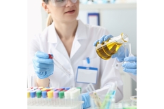 Scientists assessing the assessing the lipid composition of oil