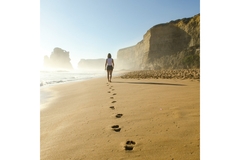 Woman walking on the beach