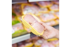 Image Packaged chicken breast in supermarket.