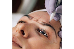 Image woman getting eyebrow shape drawn