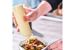 Image Sauce over a salad.
