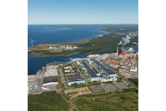 Aerial view of production site by shore