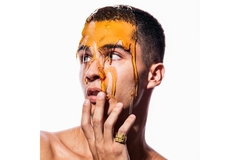 honey on a man's face