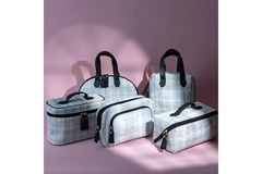 A display of travel makeup bags.