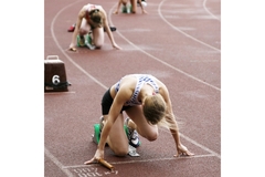 Image Female athletes poised for a race