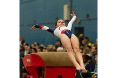 Female gymnast in action