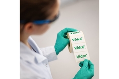 Image Woman holding labels.