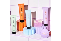 Image A collection of Faace products in a bathroom.