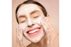 Woman applying skin care