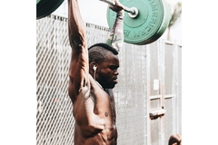 Image Man lifting weights at a gym