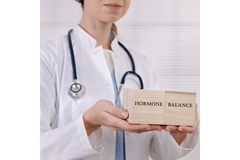 Image Female doctor presenting hormone balance issue
