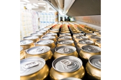Aluminum cans on conveyor belt.